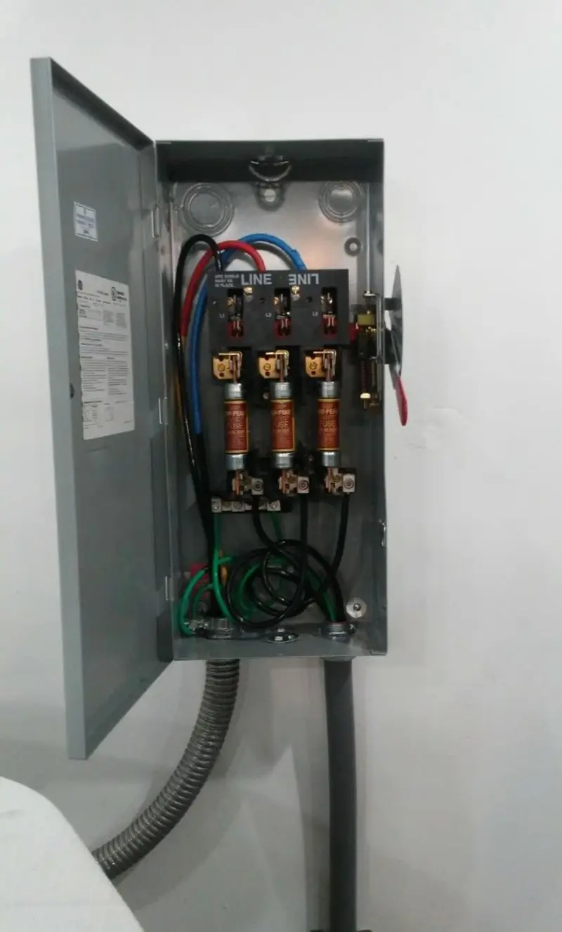 Three-phase disconnect switch installed for Smoke Detector Installation in Lansing